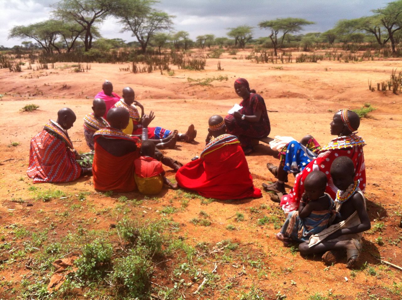 Research assistant, Jaqueline Nalenoi, discussing water security with a group of women in Sessia location, Samburu
