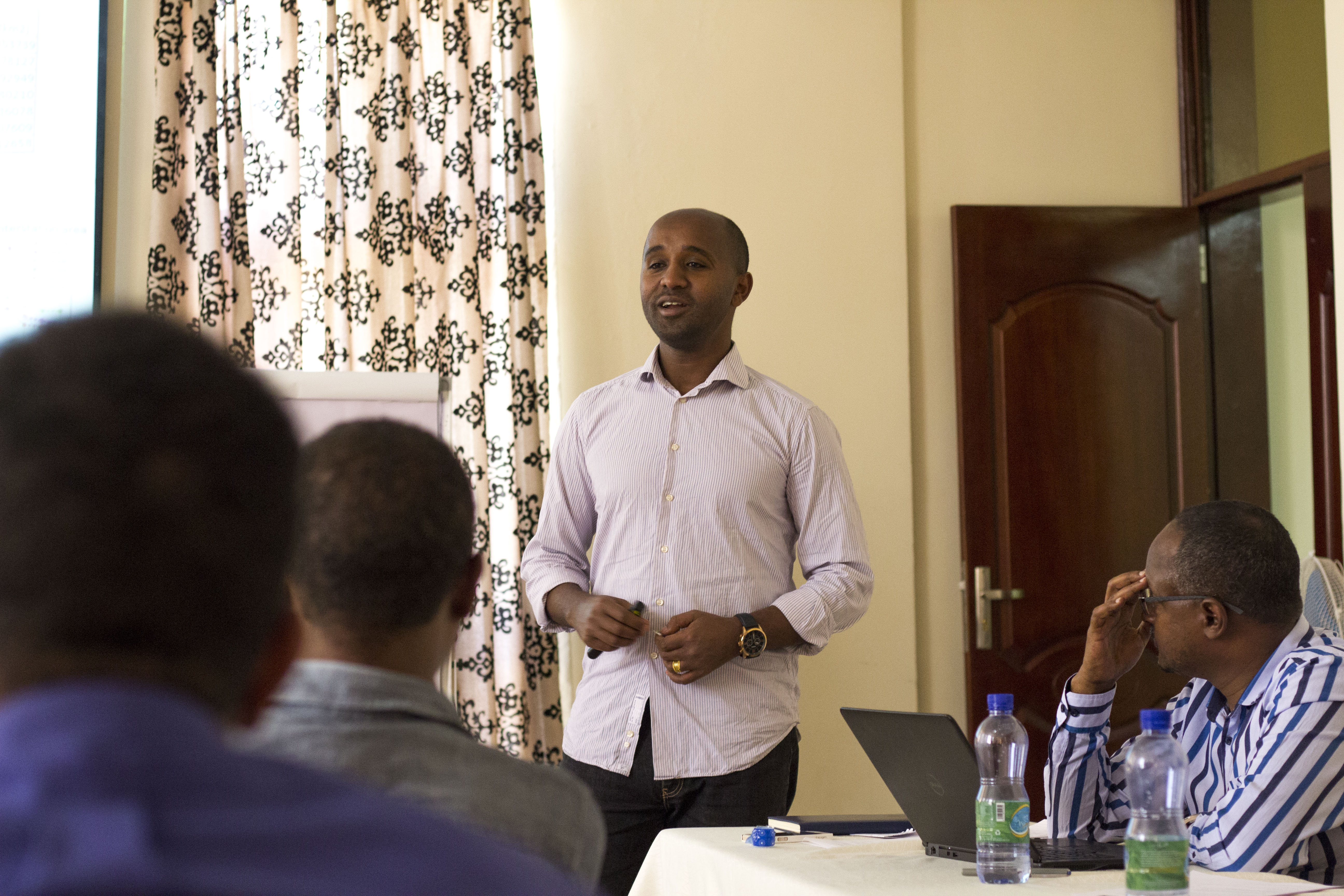 Feyera presenting hydrology research to the Awash Basin Development Office, Ethiopia, November 2018; Credit: Alice Chautard