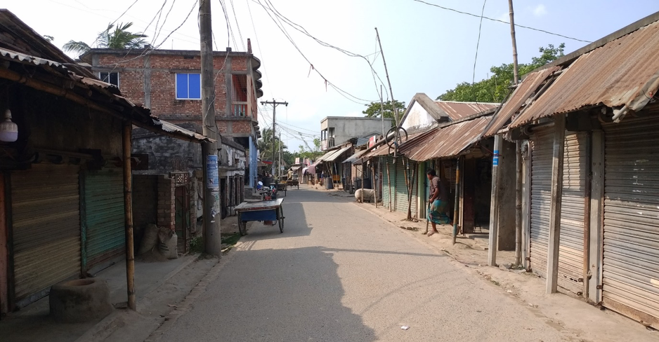 Empty road and closed shops in Polder 29, Bangladesh. Credit: Lutfor Rahman